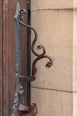 church brown wooden door with handles details