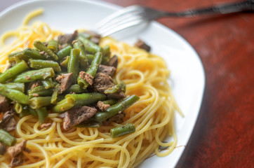 Plate with Hot Delicious Pasta with Meat and Green Beans