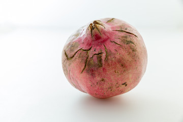 Pomegranate with cracks on the skin