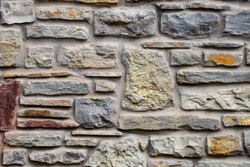 Texture of a stone wall. Part of a stone wall, for background or texture