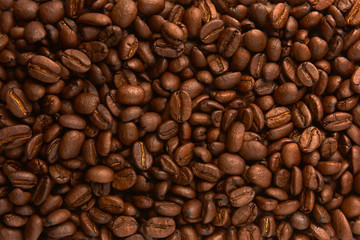 Brown coffee background flat.  Оne coffee bean in the middle..
