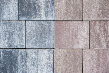 Brick wall with variegated brown bricks. Used as a background. Stone wall texture. Decorative tile. Textured background. Marble. Stone background. Stone Bricks Wall. Stone Tiles Background Four. 