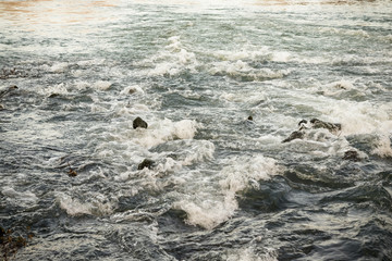 Beautiful view on a stormy river in the autumn. Toned