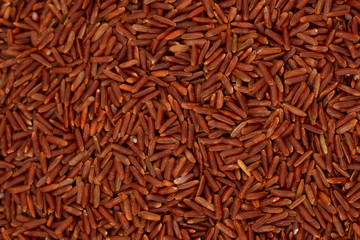Raw brown rice background. Healthy diet food