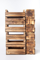 Handmade burned wooden boxes on a light background
