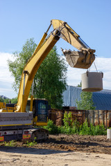 excavator unloads materials