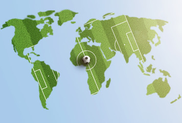 textured green grass soccer field on world map © Christian Horz