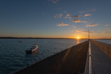 Fototapeta premium Breakwater sunrise calm