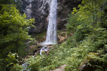 drone flight over giant big waterfall called Wildensteiner waterfall in austria
