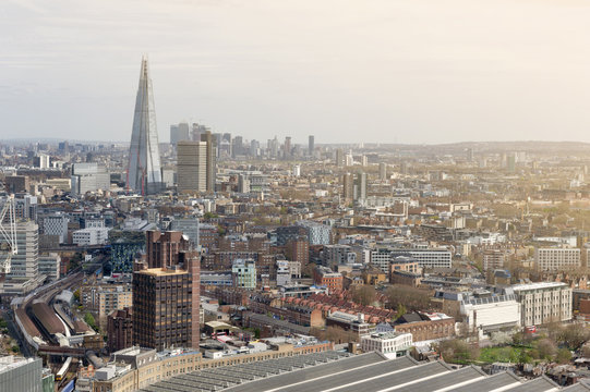 Aerial view of cityscape and skyline of London with the Shard, tallest building in UK and Europe, iconic architectural landmarks of London, England, United Kingdom