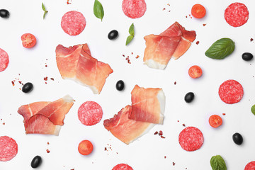 Flat lay composition with ingredients for pizza on white background