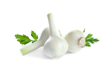 Fresh ripe garlic and parsley on white background