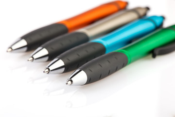 Set of bright pens. Objects on a white background
