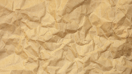 Brown creased paper for a background texture.