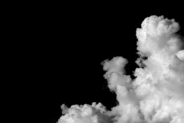 White clouds in the sky at night.