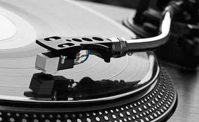 Record player playing vinyl