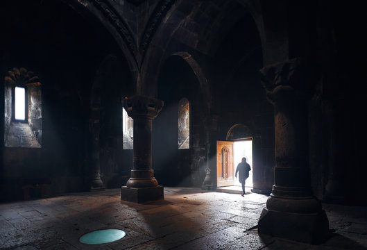 Interior view of ancient Christian Church of Geghard, located in gorge of mountain river. Unique architectural structure in Armenia. Unesco World Heritage Site.