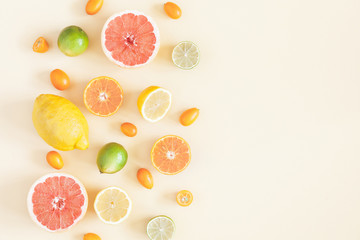 Summer fruits on pastel yellow background. Summer concept. Flat lay, top view, copy space