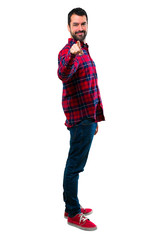 Fototapeta premium Handsome man points finger at you