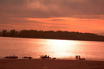 Obraz na płótnie Canvas bank of the river at sunset