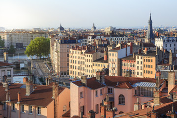 Fototapeta na wymiar Summer sunrise over Vieux Lyon and Croix Rousse in the French city of Lyon.