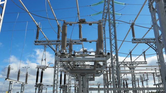 motion back under high voltage lines at electric station
