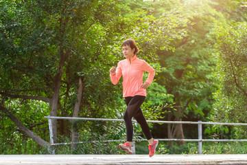 young female running in the park