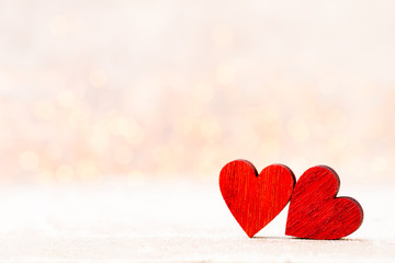 Background with wooden hearts, place for text.