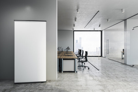 Coworking office with empty banner