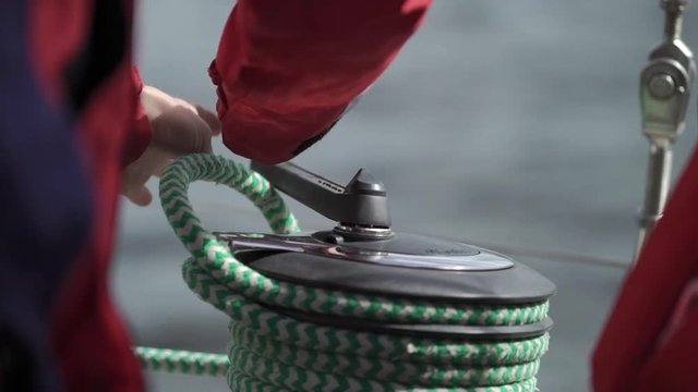 Rope windlass on sailing yacht at windy sunny day