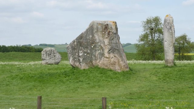 Raven Flies Above The Stone Circle At Avebury, A Neolithic Henge Monument And An Unesco World Heritage Site, Wiltshire England