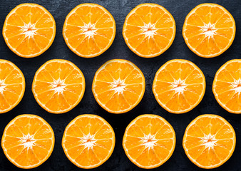 Half cut oranges texture background
