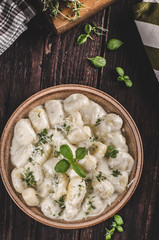 Cheese gnocchi with blue cheese sauce and galic