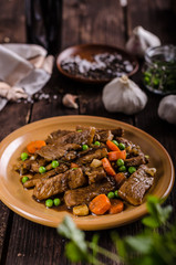 Pork medallions with vegetable and soy garlic sauce