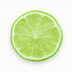 half slice of fresh lime isolated on white background