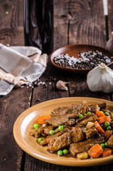 Pork medallions with vegetable and soy garlic sauce
