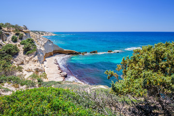Beach, Greece - Kos Island, Kefalos: Picturesque deep blue Caribbean Bay with wild sea of...