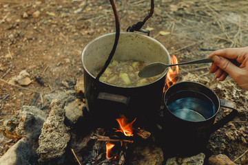 Bot of food cooked at the stake in the camp.