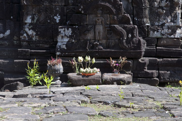 Angkor Cambodia, View of offerings in front of carving at the Preah Neak Pean temple