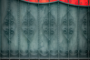 wrought-iron gates, ornamental forging, forged elements close-up