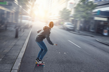 Teenager girl ride her skateboard. Mixed media