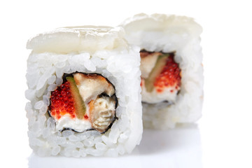 Traditional fresh japanese sushi rolls on a white background, close-up, selective focus.