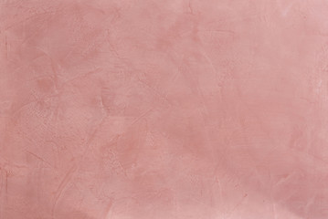 Natural bordoux plaster background with abstract pattern, close-up, macro.