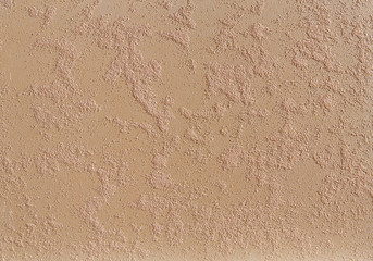 Beige rough wall textured background. Abstact stucco. Texture of plaster on the wall.