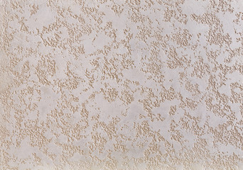Beige rough wall textured background. Abstact stucco. Texture of plaster on the wall.