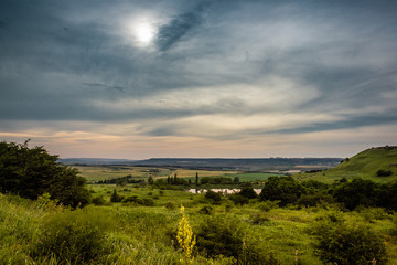 lake around fields and meadows