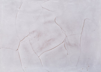 Obraz premium White plastered wall background with abstract pattern, close-up, macro.