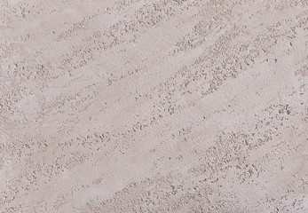 Beige rough wall textured background. Abstact stucco. Texture of plaster on the wall.