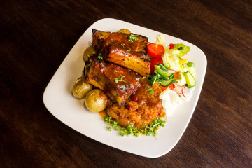 Dish with pork ribs and vegetables