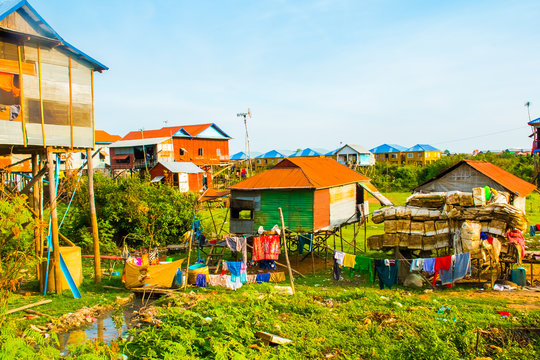 Colorful houses on stilts of floating village Phnom Krom, Tonle Sap, Cambodia